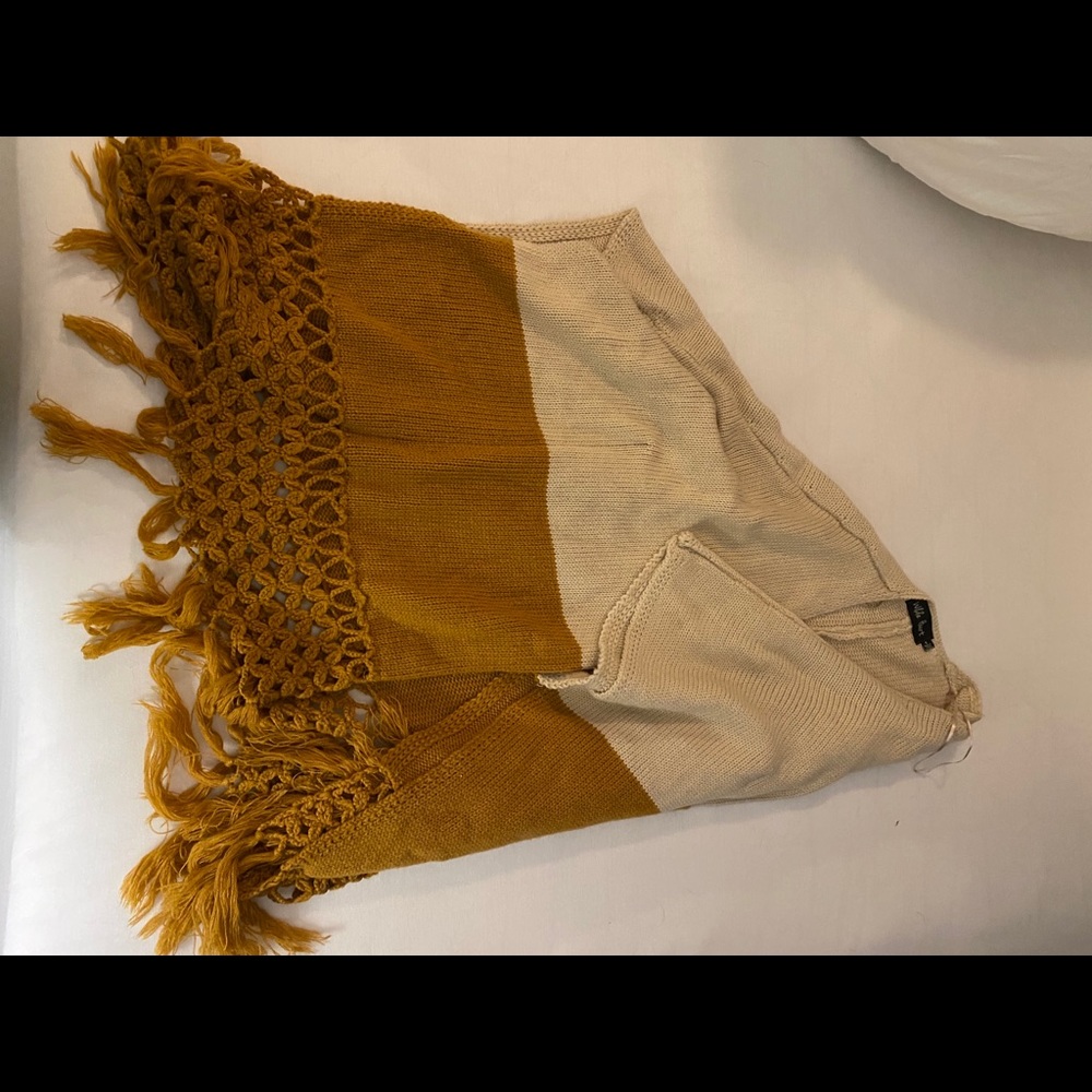 Poncho purchased on Revolve